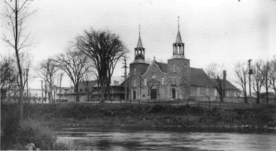 The church and its two rectories.