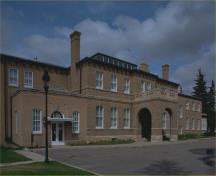 General view of Government House, showing the brick and stone construction materials, 1983.; Parks Canada Agency / Agence Parcs Canada, 1983.