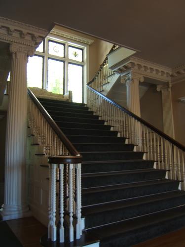 Staircase, landing and leaded glass windows