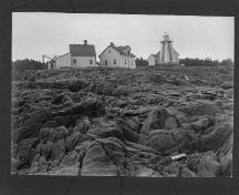 Historic photograph of Prim Point Lighthouse in Nova Scotia; Library and Archives Canada, Department of Interior | Bibliothèque et Archives Canada, Ministère de l'intérieur, PA-048374