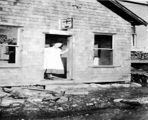 Old Whonnock Post Office and Miss Margaret Milne, Post Mistress, 1920-1921; Maple Ridge Museum and Archives, P00273