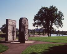 General view of Cartier-Brébeuf, showing a monument and a view of the Saint Charles River.; Parks Canada Agency / Agence Parcs Canada.