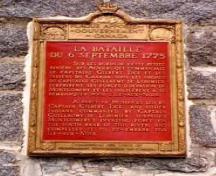 Photo of the plaque commemorating the site of the Battle of September 6th, 1775.; Parks Canada | Parcs Canada