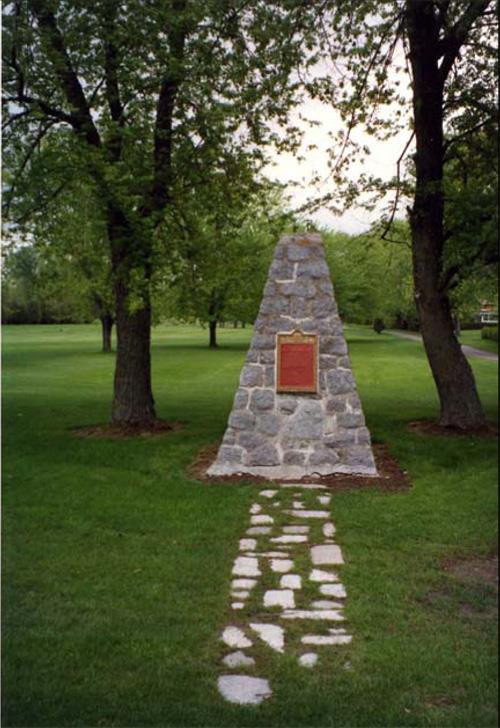 Photo of plaque and cairn