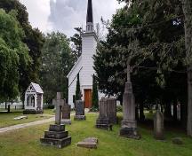 View of the main entrance to Her Majesty's / St. Paul's Chapel of the Mohawks, showing the tower and steeple rising from the front entry porch.; Her Majesty's Royal Chapel of the Mohawks' Archives | Archives de Her Majesty's Royal Chapel of the Mohawks