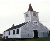 General view of Little Dutch (Deutsch) Church, showing its small scale, rectangular massing, pitched roof and belfry with polygonal spire, 1995.; Parks Canada Agency / Agence Parcs Canada, 1995.