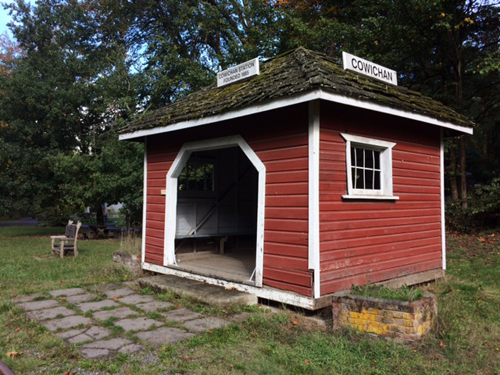 Exterior southern view of shelter, signage and brick flower planters, 2016