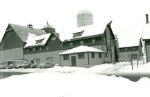 General view of the Main Dairy Barn, showing the rural, picturesque, yet functional design, 1987.; Parks Canada Agency / Agence Parcs Canada, M. Trépanier, 1987.