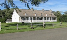 Façade principale de la maison de la Petite-Ferme du cap Tourmente; Parks Canada | Parcs Canada