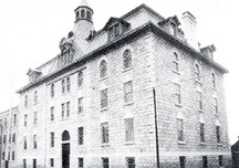 Corner view of the La Salle Academy, showing the exterior of the College Building, which was restored at the same time to its post-1890 appearance, 1899.; Ministry of State for Urban Affairs / département d'État chargé des Affaires urbaines, 1976 (La Salle, p.33, 1899).