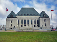 Front facade of the Supreme Court Building showing the carefully proportioned, symmetrical design which is enhanced by the use of elegant materials to create a dignified sense of occasion and presence, 2011.; Parks Canada | Parcs Canada, M. Therrien, 2011.