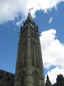 Detail view of the Peace Tower of Centre Block emphasizing its conception as a symbol of Canada, 2010.; Parks Canada | Parcs Canada
