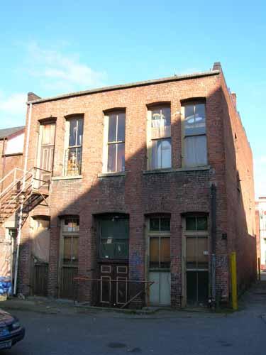 Rear façade showing Klondike-era courtyard