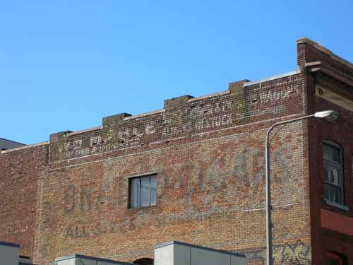 Painted sign on east façade