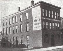 The Times Building with exposed brick.; Moncton Museum