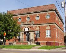 The Masonic Temple has seen little change since its construction in 1923.  Fire forced some renovation to the roof.; Moncton Museum